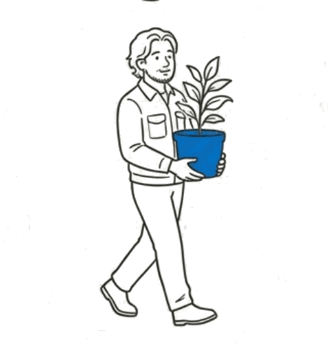 植木鉢を抱えて運んでいる職人